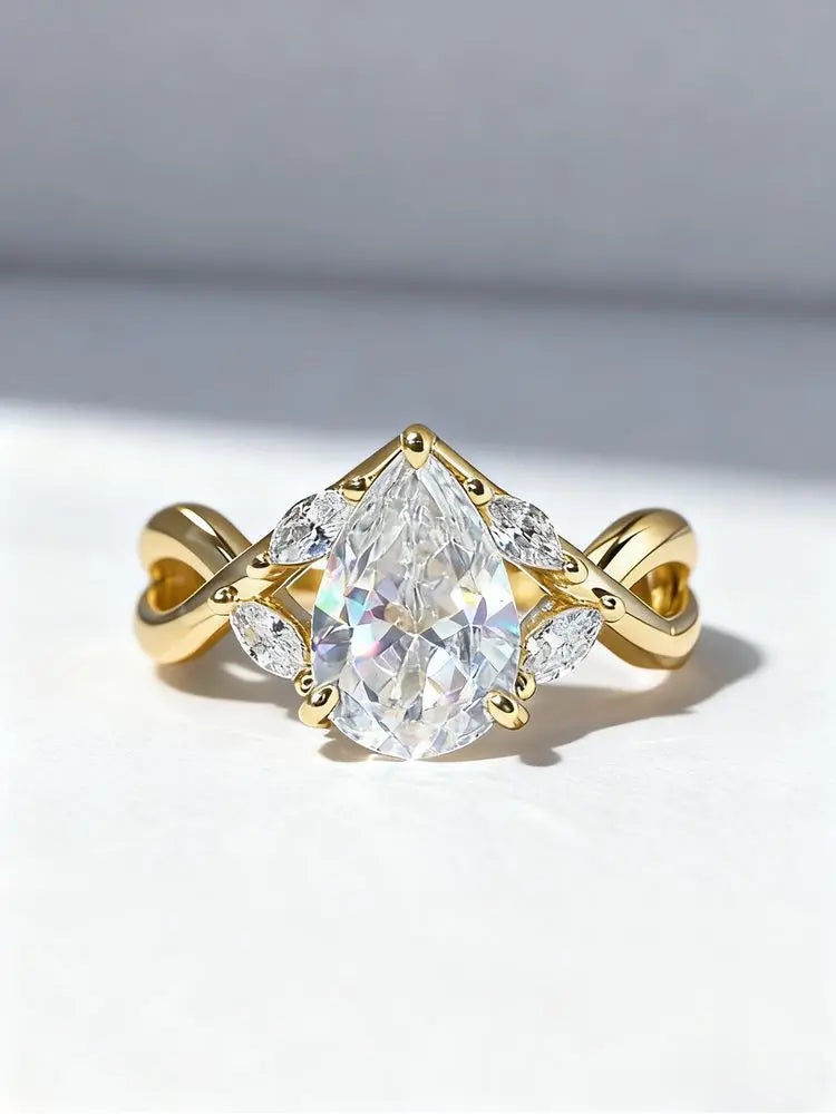 Bague élégante en argent avec croix et zircon goutte d’eau